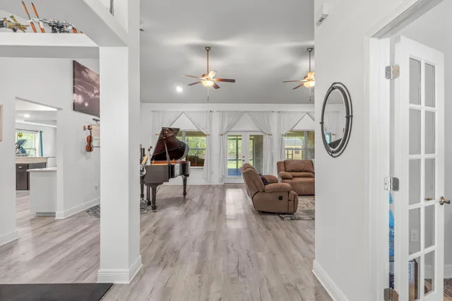 a view of living room and dining room