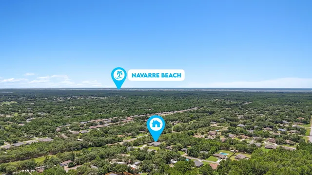 a view of outdoor space with sign board and city view