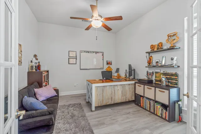 a kitchen with stainless steel appliances kitchen island granite countertop a sink and cabinets