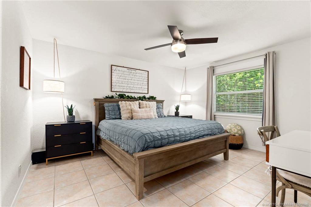 4401 Southeast Satinleaf Place Stuart, FL 34997 - Photo 18 of 51 Primary Bedroom