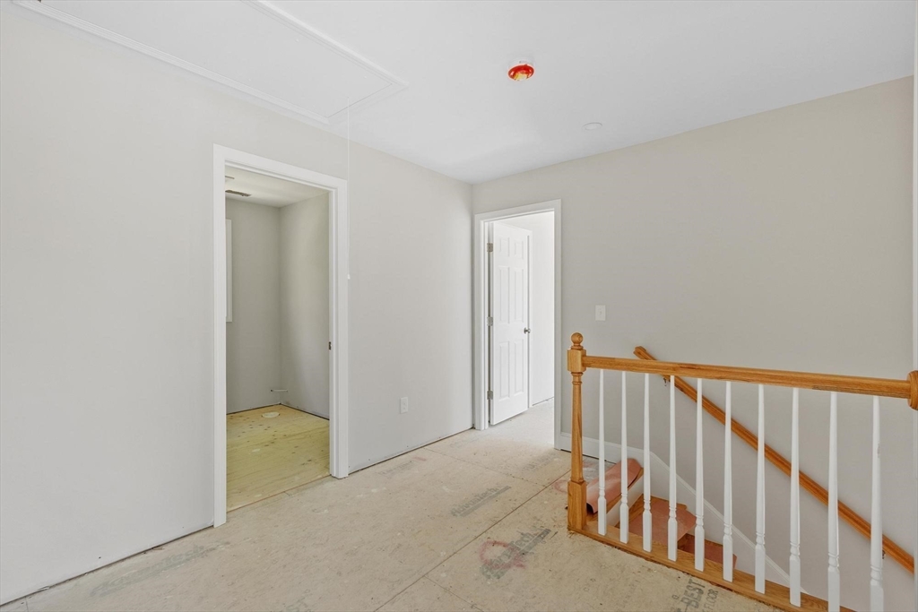 22 Benoit Avenue Pelham, NH 03076 - Photo 29 of 42 a view of a hallway with a hallway