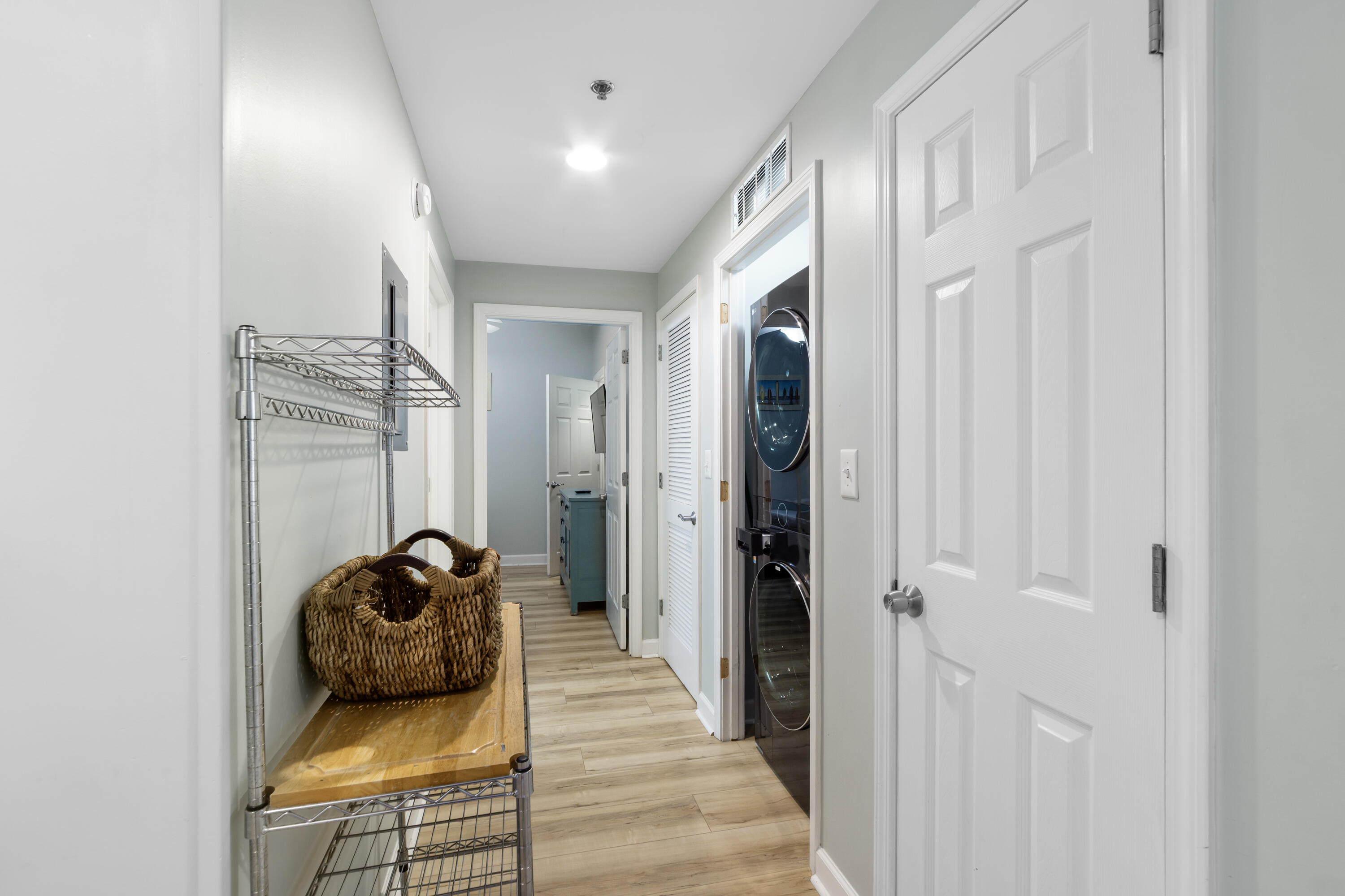 17739 Front Beach Road, Unit 1902W Panama City Beach, FL 32413 - Photo 24 of 54 a hallway with a view of living room