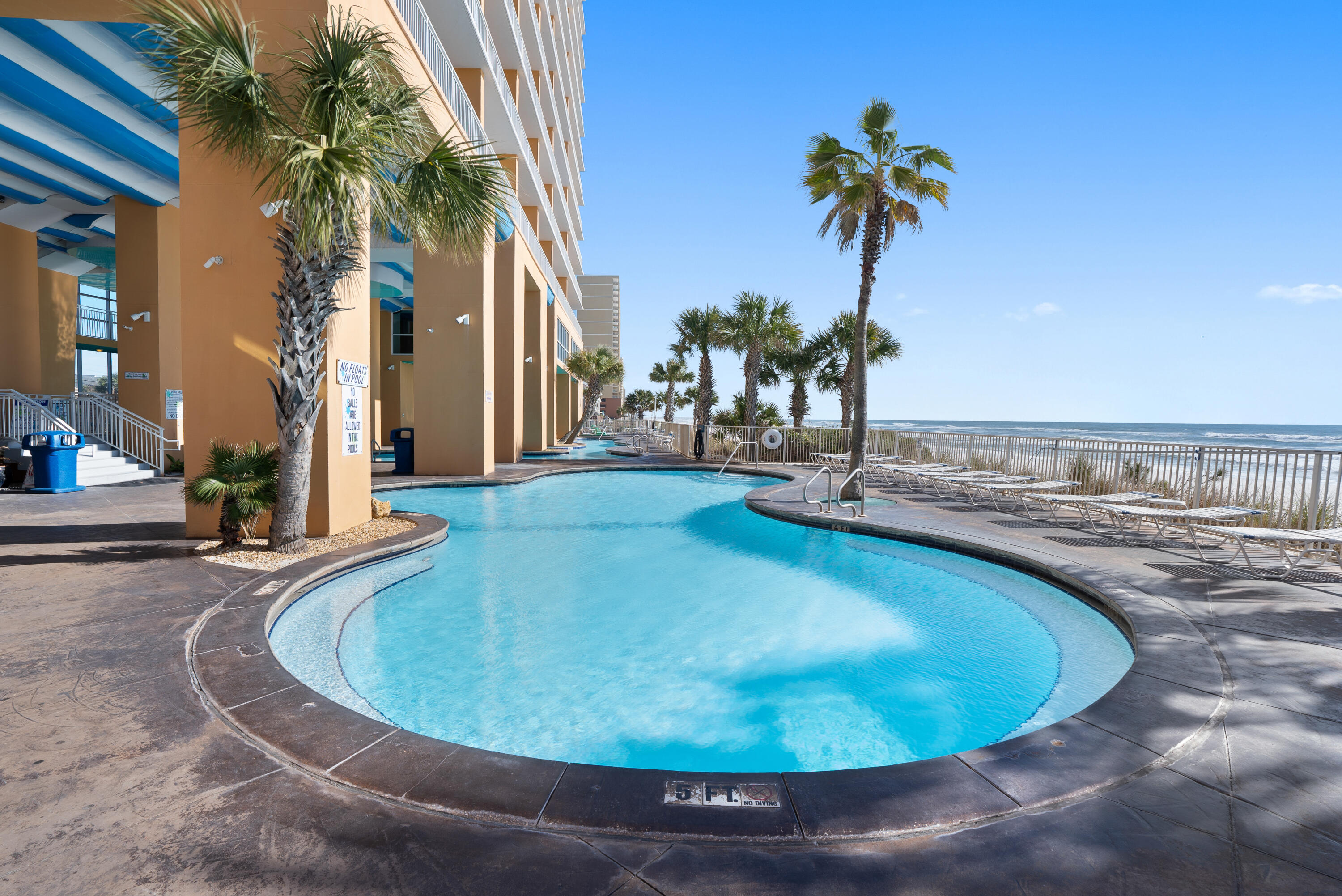 17739 Front Beach Road, Unit 1902W Panama City Beach, FL 32413 - Photo 38 of 54 a view of a swimming pool with a house