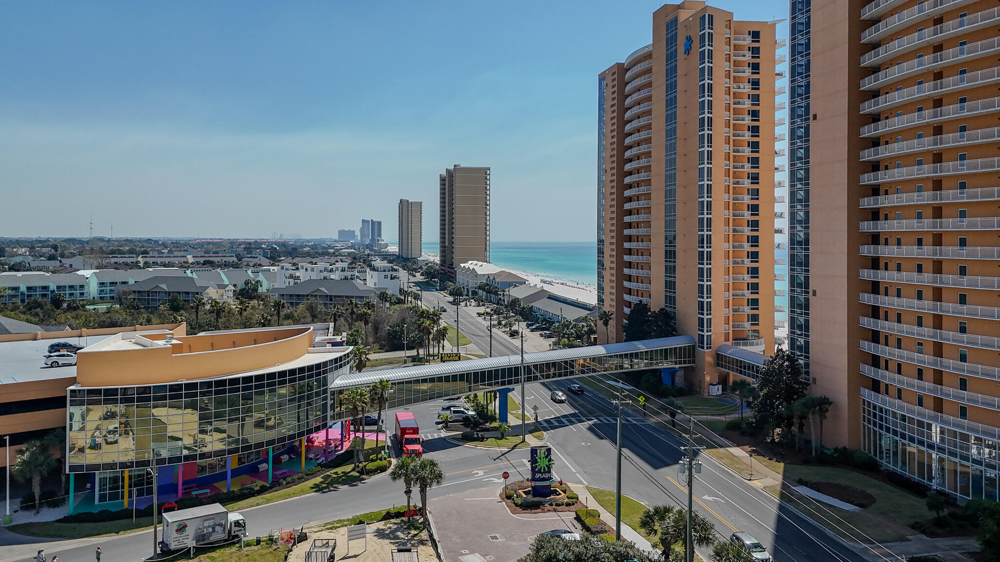 17739 Front Beach Road, Unit 1902W Panama City Beach, FL 32413 - Photo 48 of 54 a city street filled with lots of traffic and tall buildings