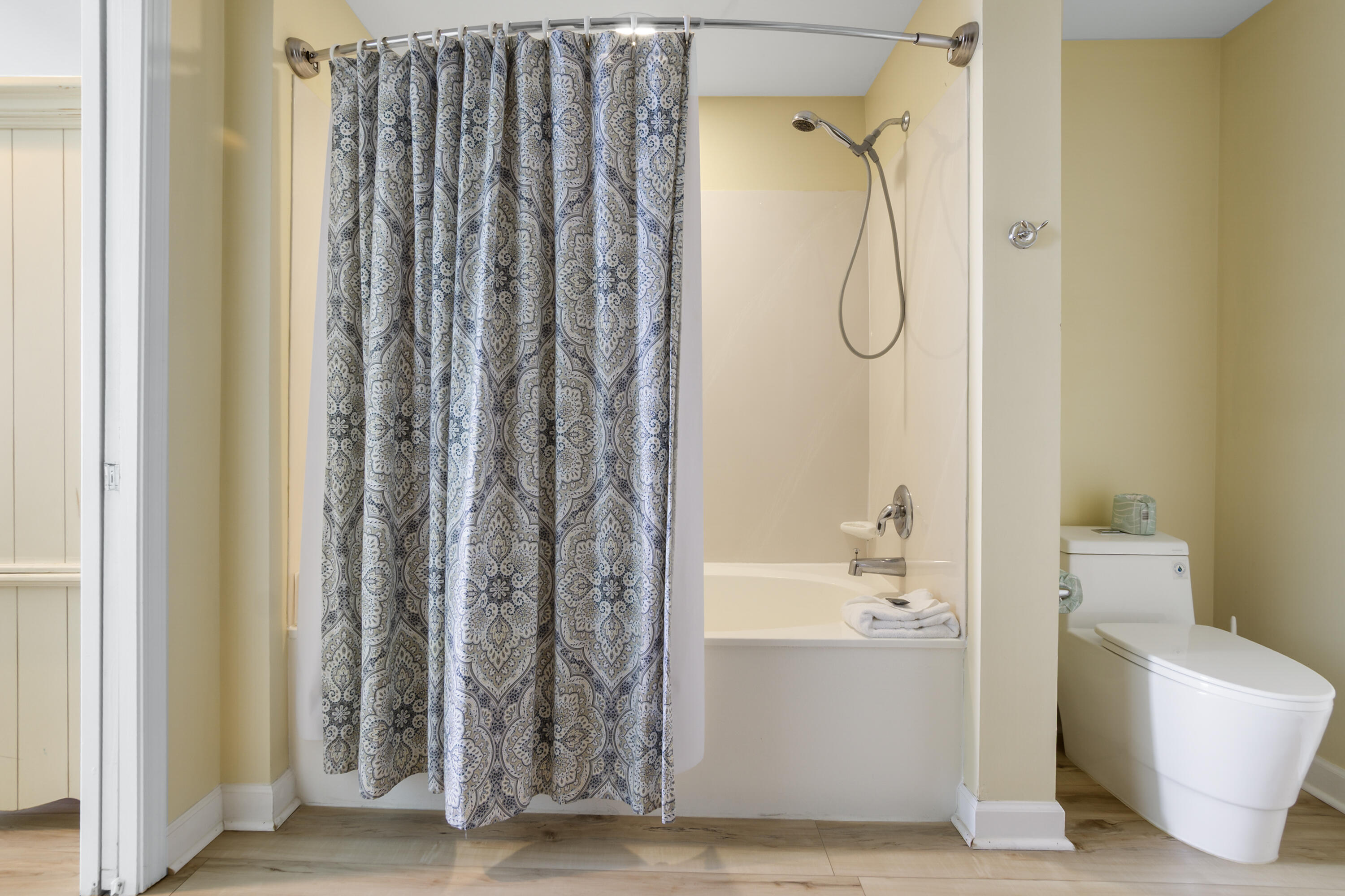 17739 Front Beach Road, Unit 1902W Panama City Beach, FL 32413 - Photo 10 of 54 a bathroom with a shower curtain and a sink