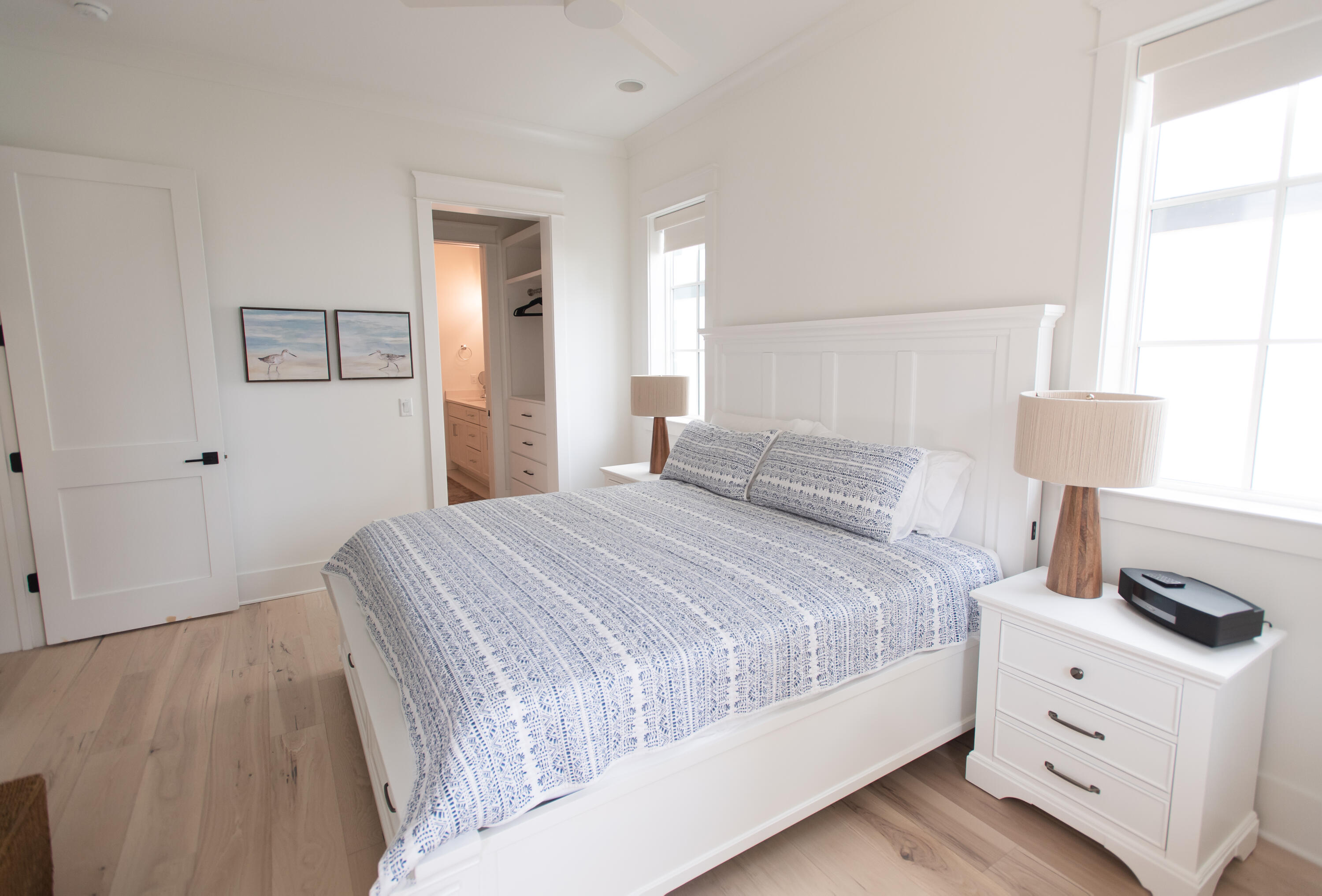 327 Grande Pointe Cir Inlet Beach Inlet Beach, FL 32461 - Photo 30 of 57 a bedroom with a bed and wooden floor