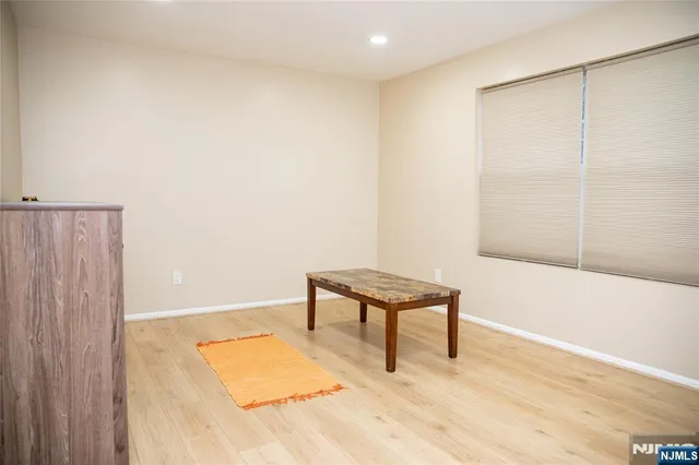 a bathroom with a shower and a bathtub