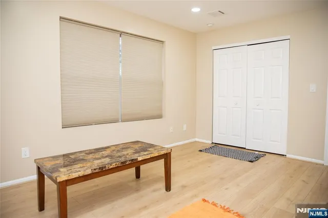 a room with a table and a window