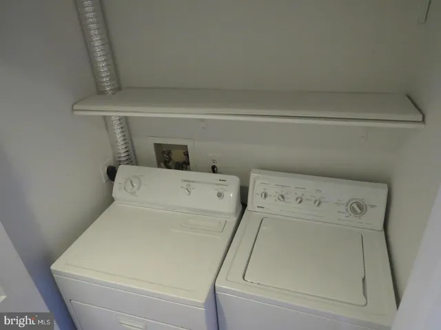 a view of balcony with wooden floor