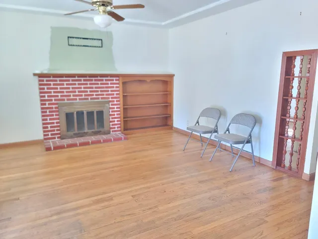 a room with furniture and a fireplace