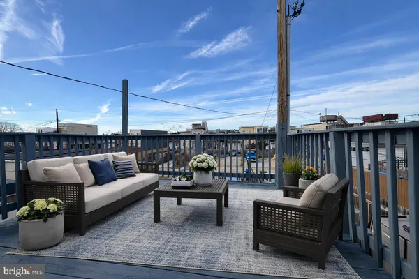a roof deck with couch
