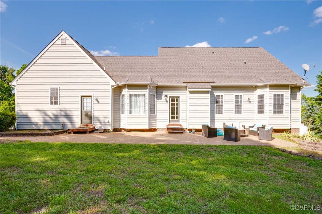 134 Gates Pointe Drive Rice, VA 23966 - Photo 3 of 20 a front view of house with yard and outdoor seating
