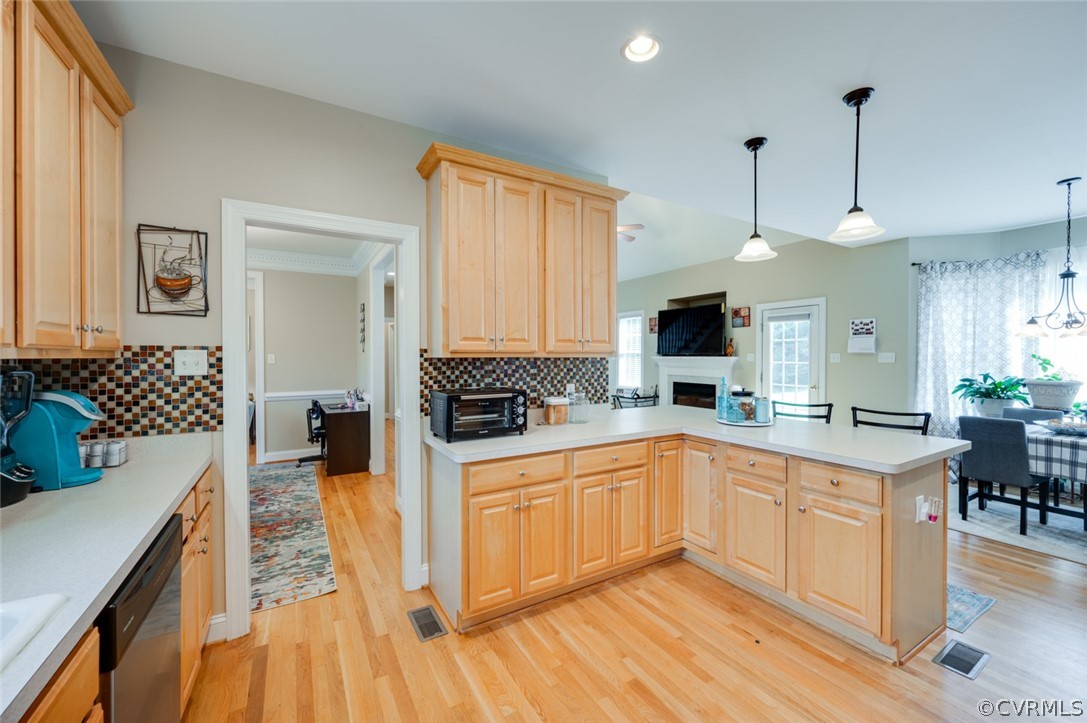 134 Gates Pointe Drive Rice, VA 23966 - Photo 7 of 20 a kitchen with stainless steel appliances a sink a stove top oven a chimney and a center island