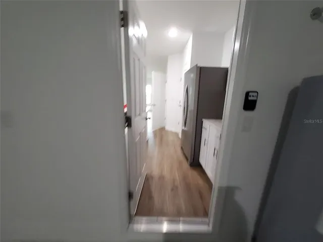 a view of a glass door of the house from a window