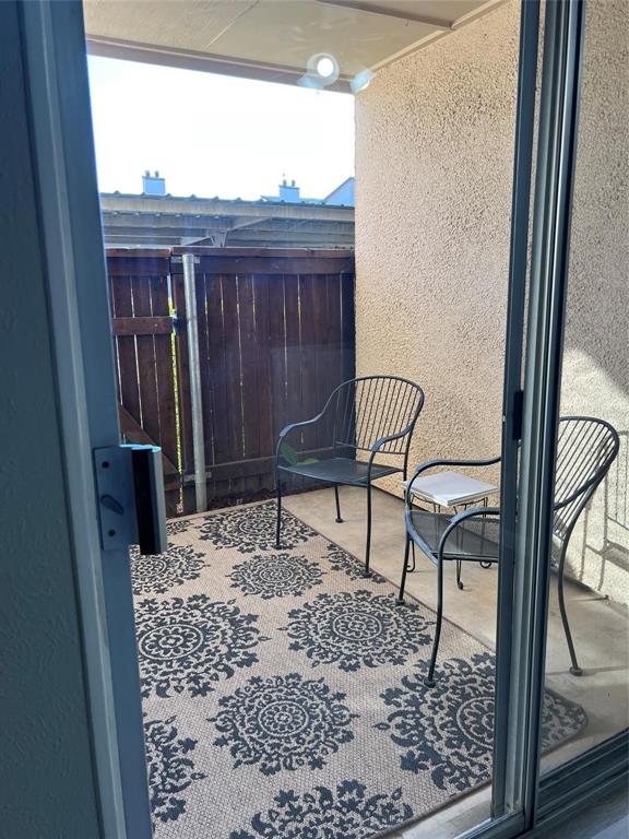 12830 Midway Road, Unit 1129 Dallas, TX 75244 - Photo 14 of 18 a view of a balcony with furniture