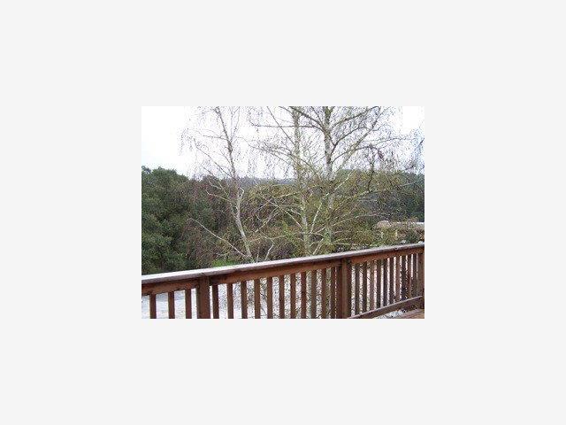 13 Erba Lane Scotts Valley, CA 95066 - Photo 2 of 6 a view of a balcony with wooden fence
