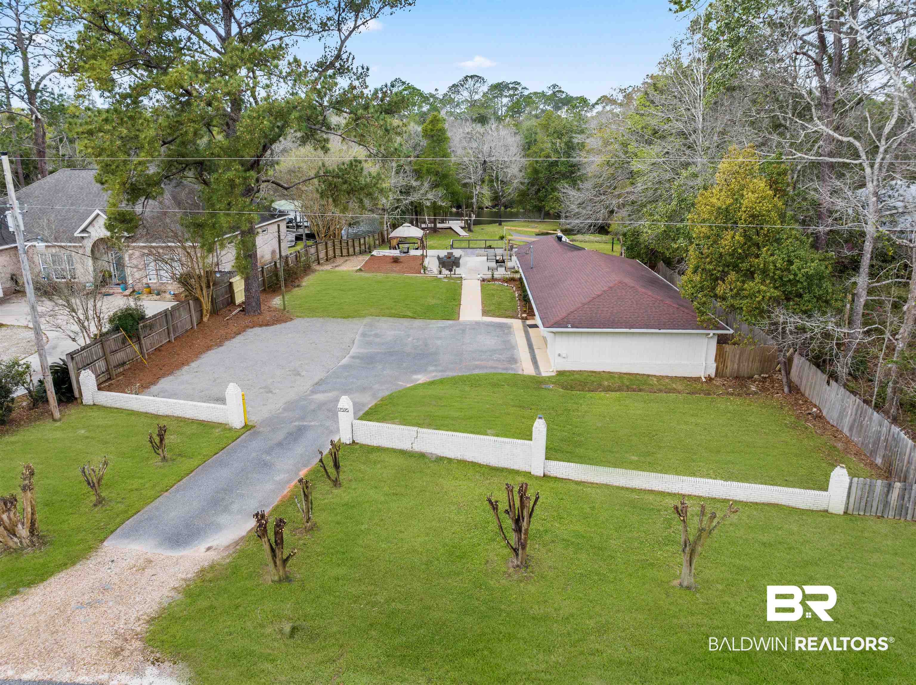 17595 River Road Summerdale, AL 36580 - Photo 21 of 29 View of community featuring driveway and view of scattered trees