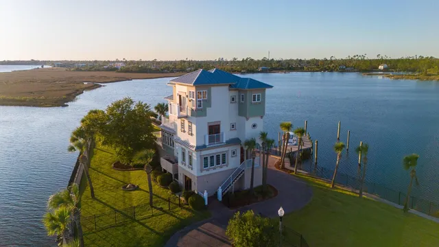 an aerial view of a house with a garden