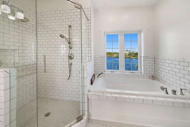 an aerial view of a house with a swimming pool and outdoor space