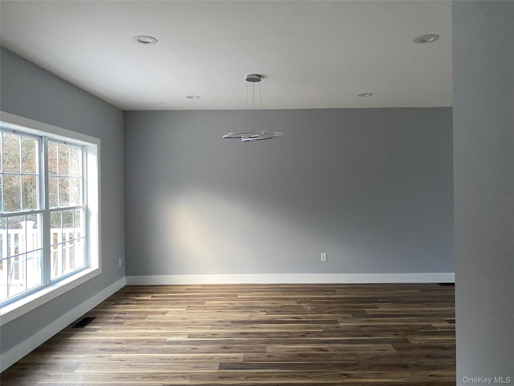 44 Roslyn Ridge Road Mongaup Valley, NY 12762 - Photo 8 of 24 Unfurnished room featuring wood finished floors and recessed lighting