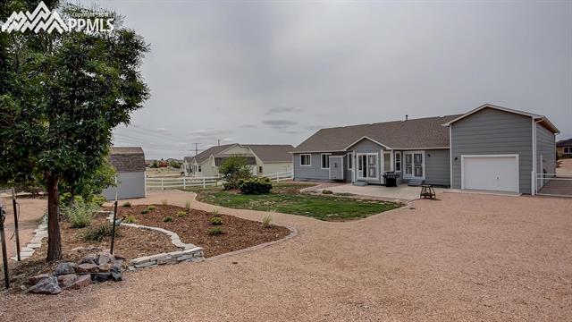 9232 Rockingham Drive Peyton, CO 80831 - Photo 31 of 35 Back View of this beautiful home.