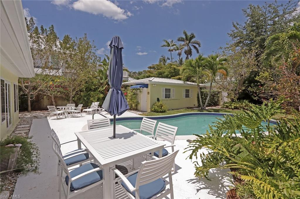 361 1st Avenue North Naples, FL 34102 - Photo 4 of 31 a view of an outdoor space with seating area
