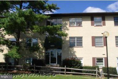4254 Buckman Road, Unit 4 Alexandria, VA 22309 - Photo 1 of 1 a view of a house with a yard and plants