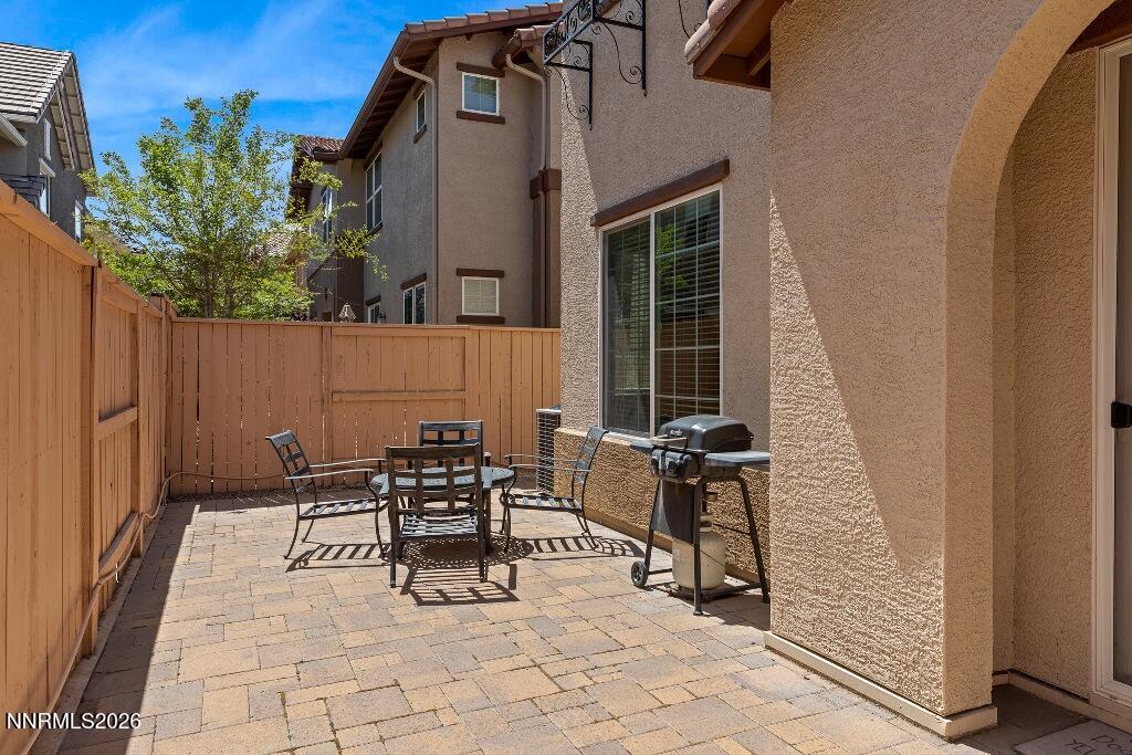1864 Wind Ranch Road, Unit B Reno, NV 89521 - Photo 16 of 42 a view of two chairs in the patio