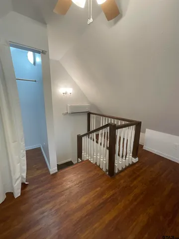 a view of entryway with wooden floor
