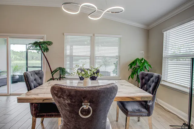 a bedroom with a bed and a television