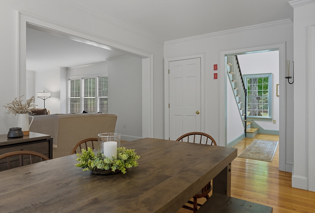 16 Priest Road Berlin, MA 01503 - Photo 14 of 42 a view of a dining room with furniture and wooden floor