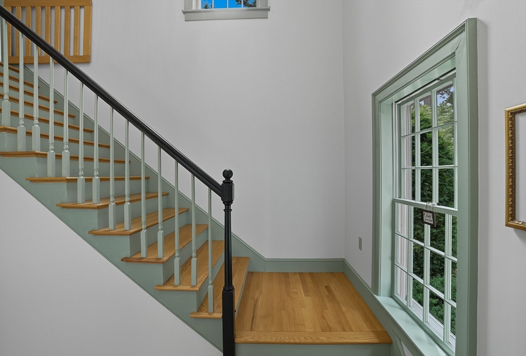 16 Priest Road Berlin, MA 01503 - Photo 20 of 42 a view of entryway with wooden floor and stairs