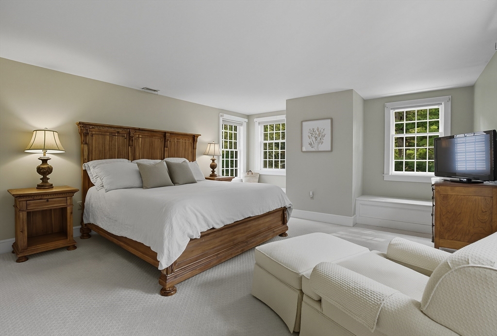 16 Priest Road Berlin, MA 01503 - Photo 21 of 42 a bedroom with a bed couch and window