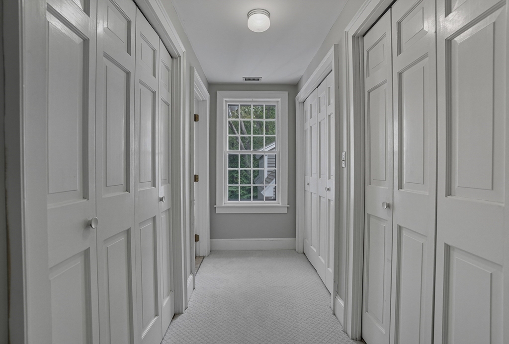 16 Priest Road Berlin, MA 01503 - Photo 24 of 42 a view of a hallway with windows