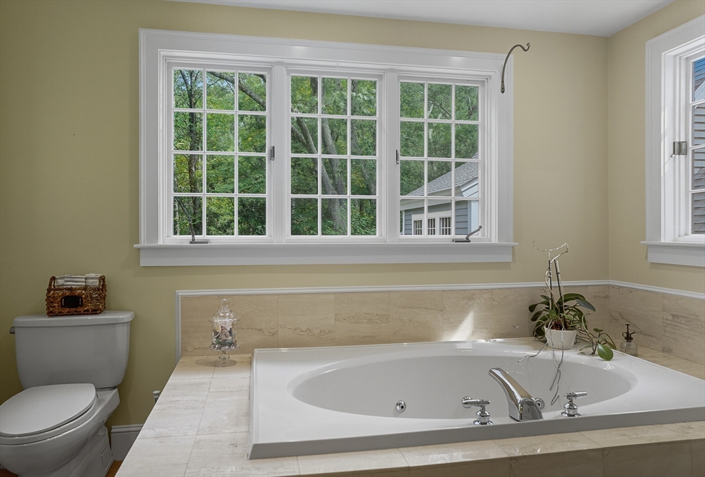 16 Priest Road Berlin, MA 01503 - Photo 27 of 42 a bathroom with a bathtub and a toilet