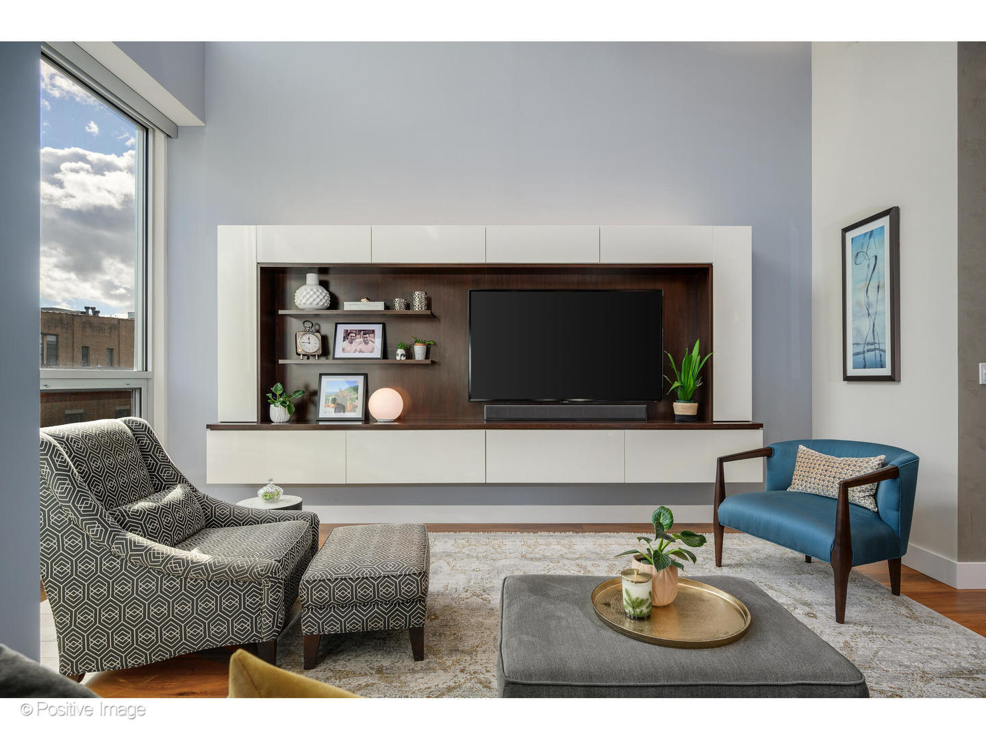 18 North Carpenter Street, Unit PHN Chicago, IL 60607 - Photo 11 of 39 a living room with furniture and a flat screen tv