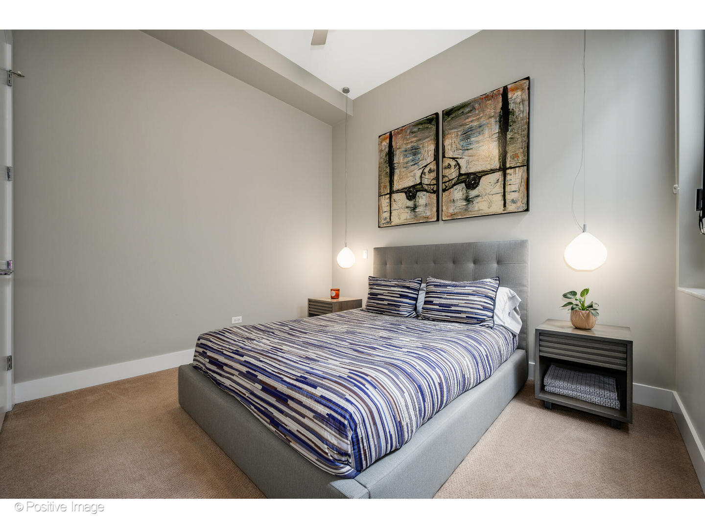 18 North Carpenter Street, Unit PHN Chicago, IL 60607 - Photo 28 of 39 a bedroom with a bed and a night stand