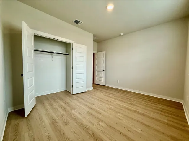 a view of a kitchen with a sink and windows