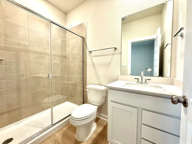 a view of hallway with a large mirror