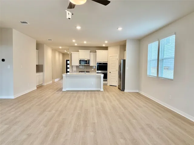 a view of a swimming pool with a garden