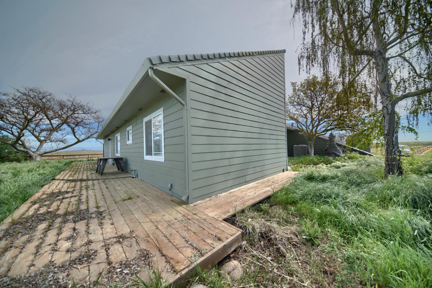 17164 Keyes Road Snelling, CA 95369 - Photo 16 of 97 front view of a house with a yard