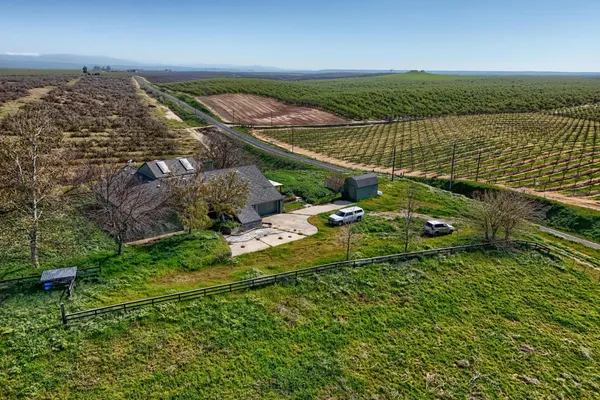 a aerial view of a house with a patio