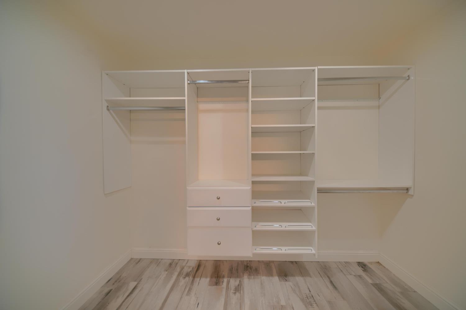 17164 Keyes Road Snelling, CA 95369 - Photo 56 of 97 a view of walk in closet with empty racks