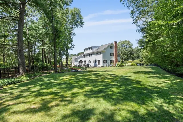 a view of a house with a big yard