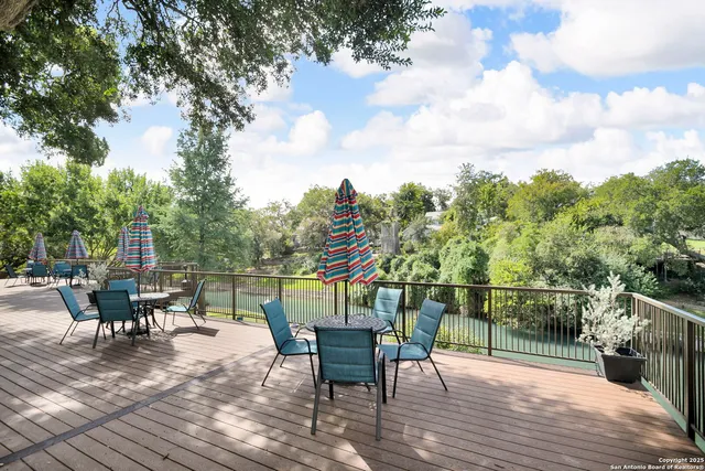 a view of a terrace with furniture