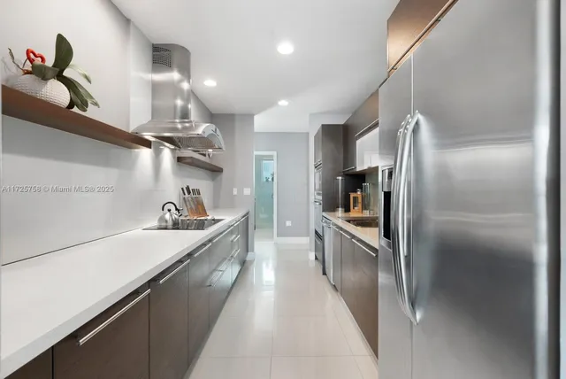 a bedroom with a bed and a television