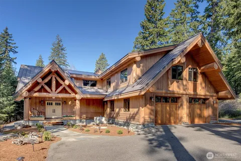 a front view of a building with a yard