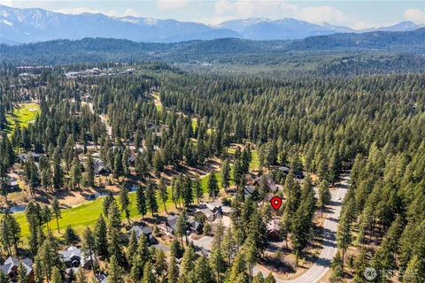 a view of a city with mountains in the background