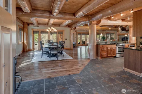 a view of a dining hall with many windows