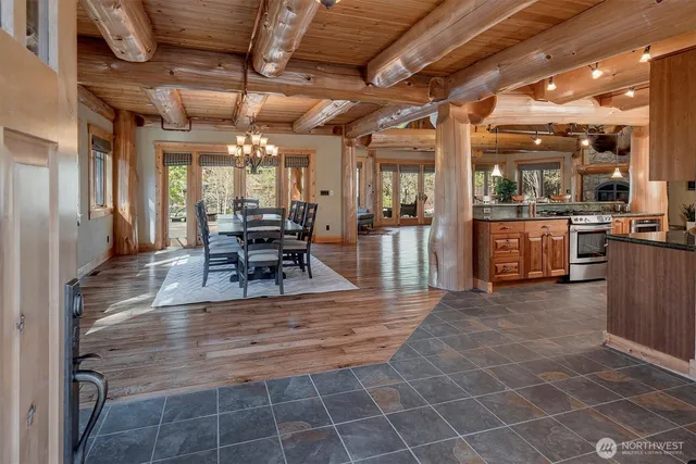 a view of a dining hall with many windows